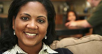 womens health sacramento - in office Woman smiling at the camera